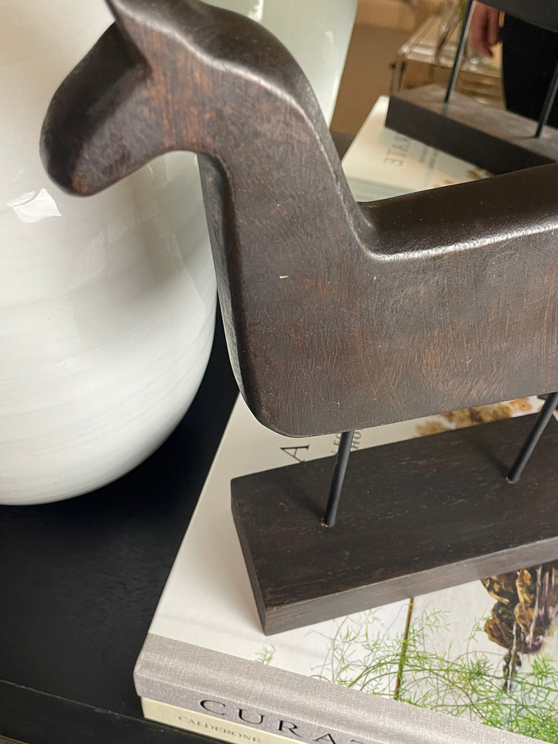 Wooden hand carved horse on stand