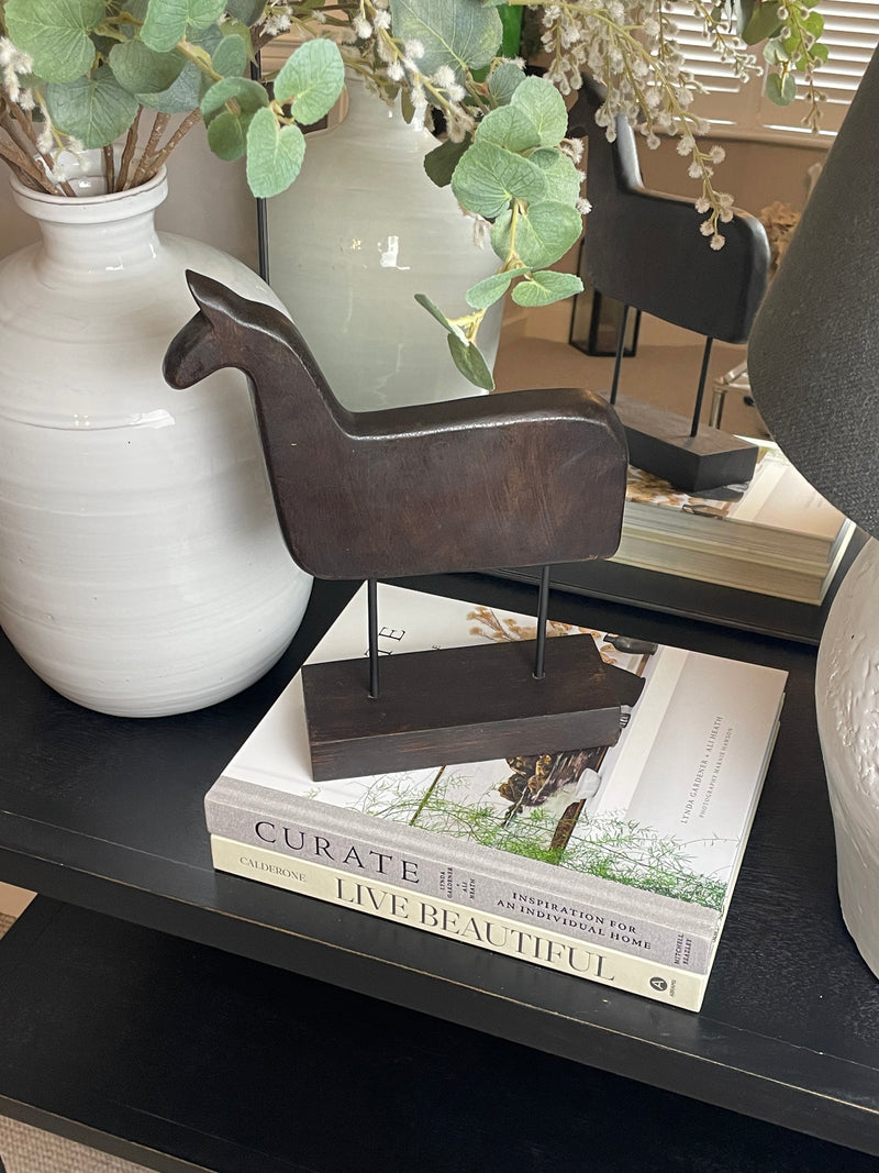 Wooden hand carved horse on stand
