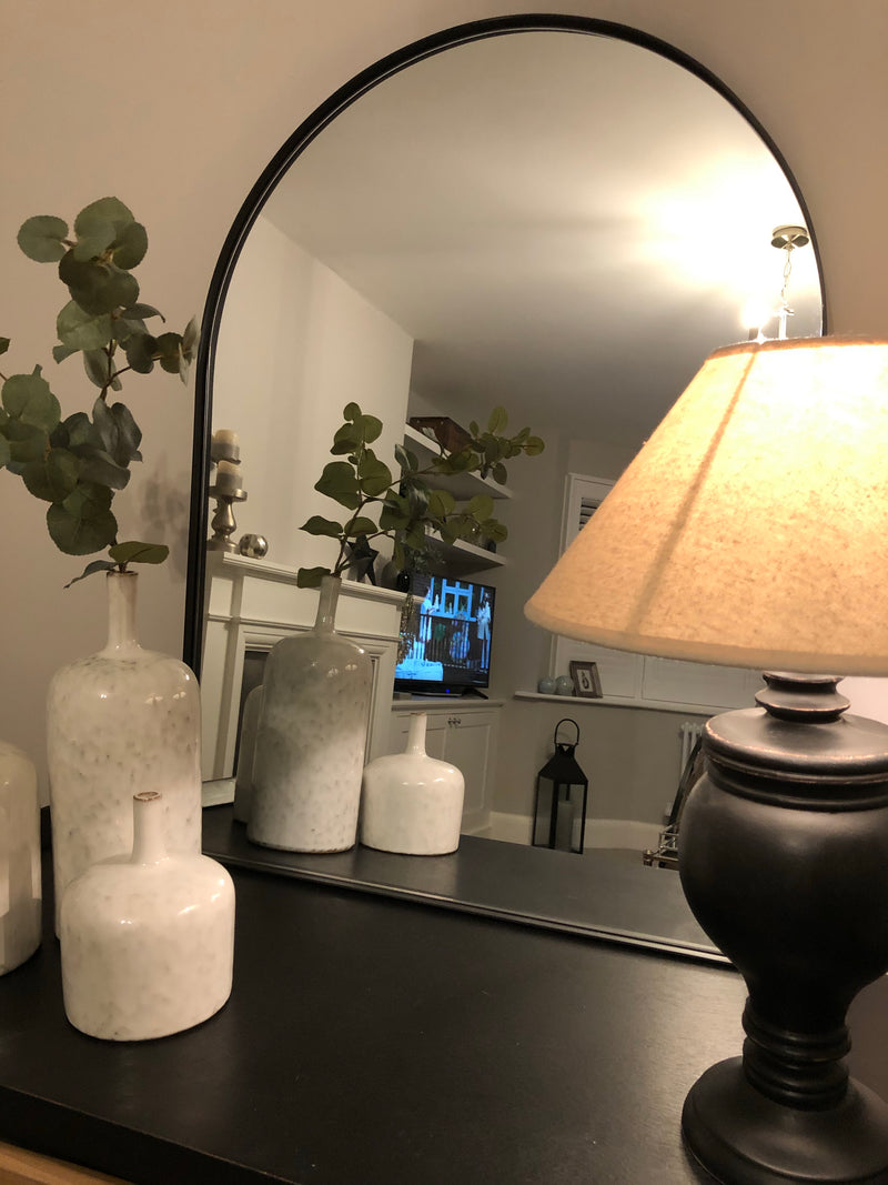 Black arched top metal mirror