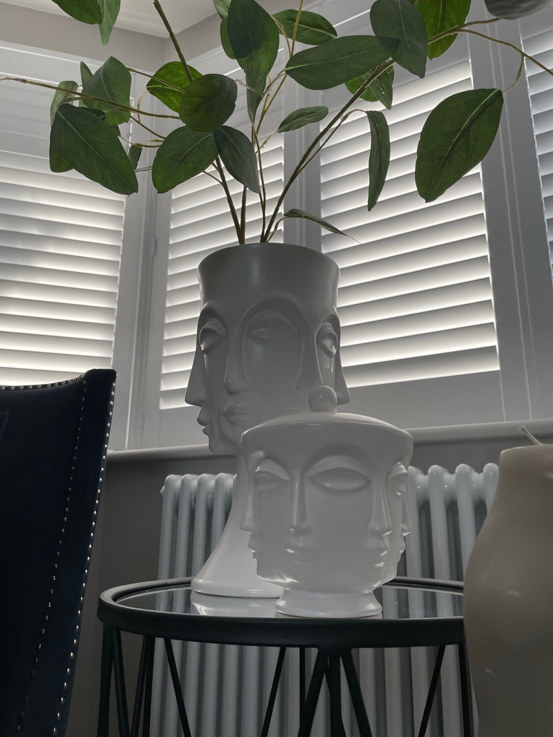 White faces ceramic lidded jar