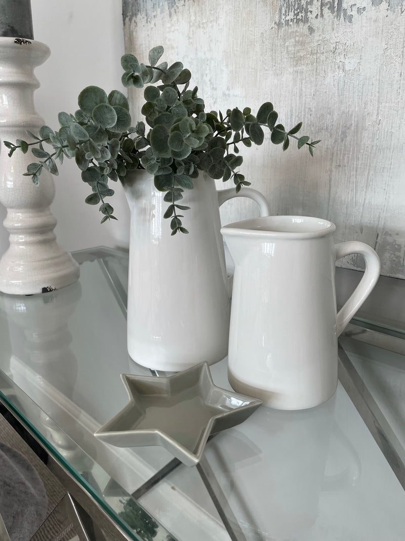 Medium simple white ceramic jug