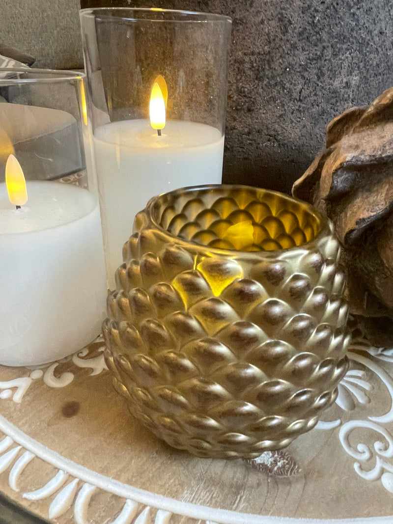 Gold heavy pine candle holder