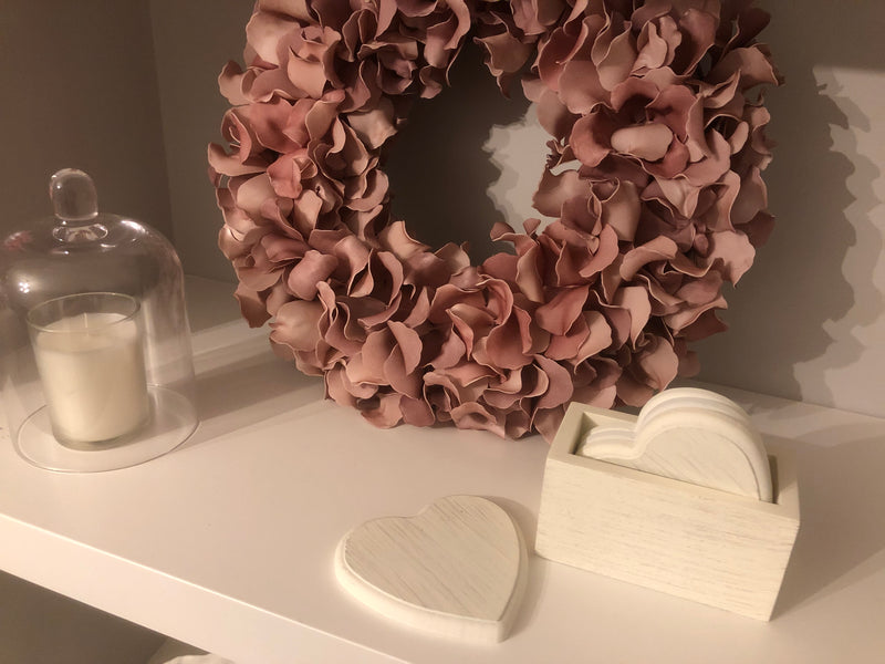 Set of 4 white wooden heart coasters in holder
