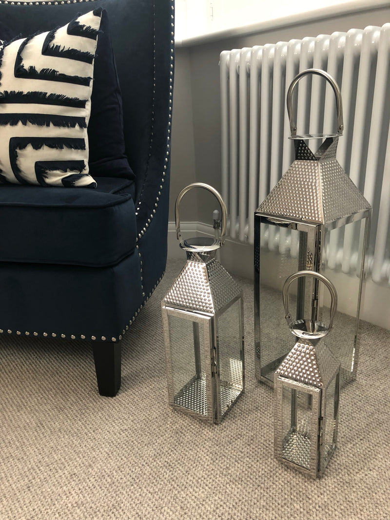 Set of three hammered chrome metal lantern