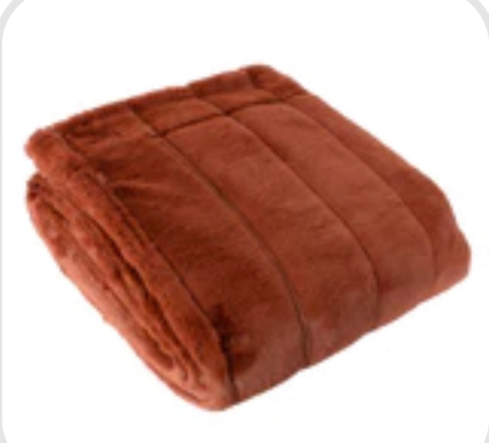 Large ribbed rust fur throw