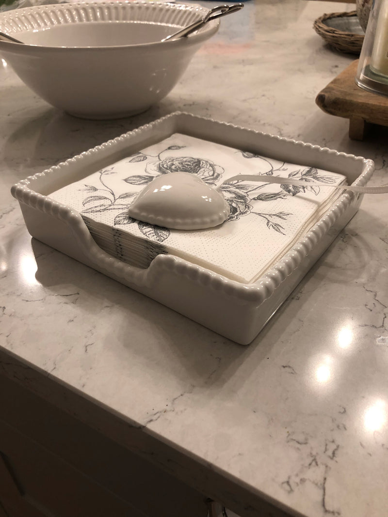White ceramic napkin holder with weight