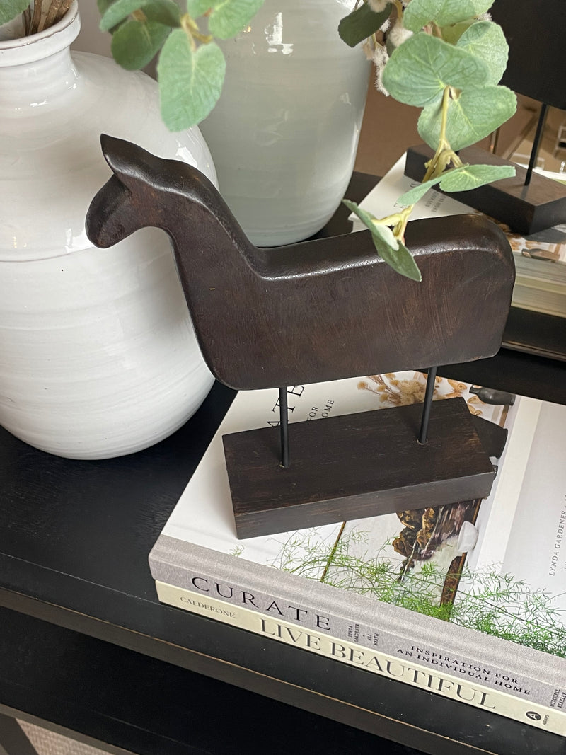 Wooden hand carved horse on stand
