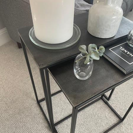 Antique black metal hammered top table