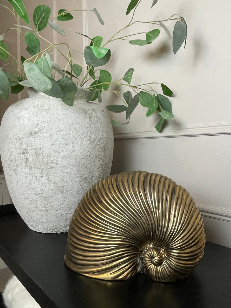 Gold sea snail shell ornament