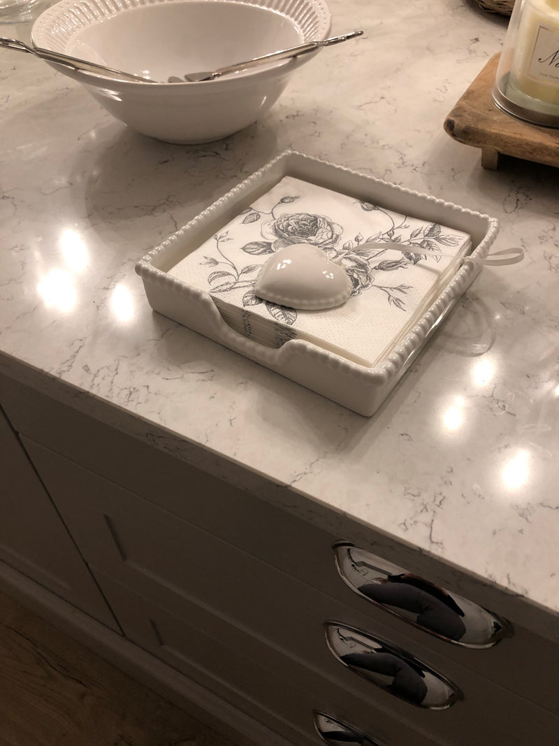 White ceramic napkin holder with weight