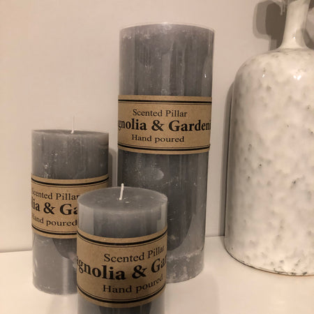 Small scented pale grey pillar candle 10x7cm
