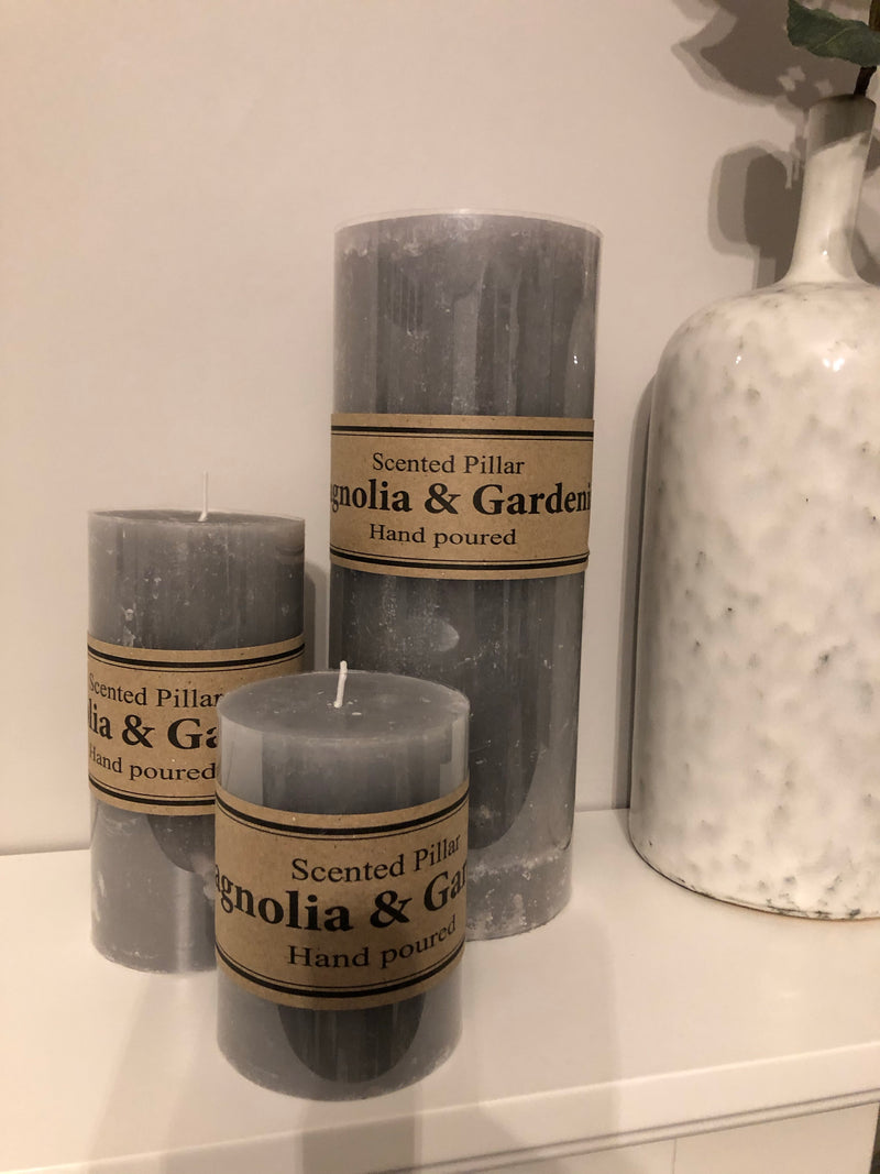 Small scented pale grey pillar candle 10x7cm