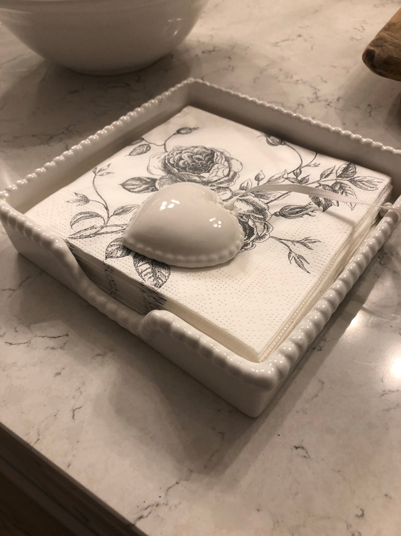 White ceramic napkin holder with weight