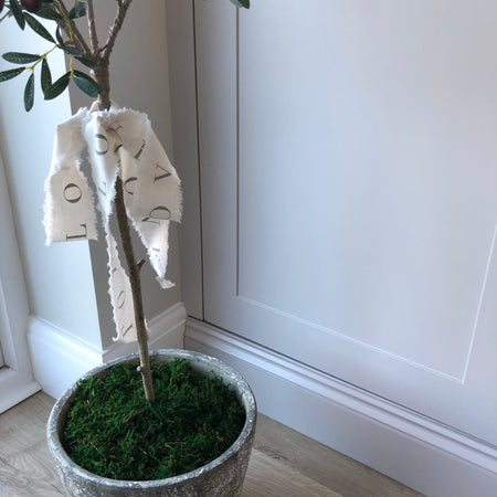 Bag of faux green moss