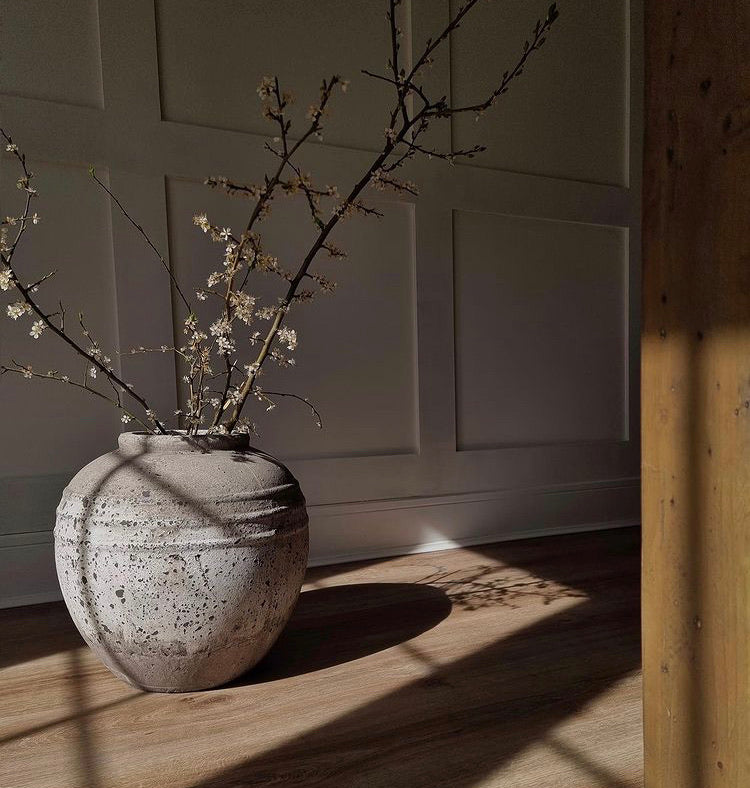 Large chunky ribbed stone round vase