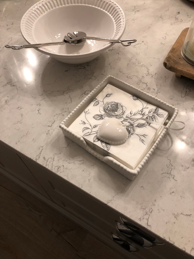 White ceramic napkin holder with weight