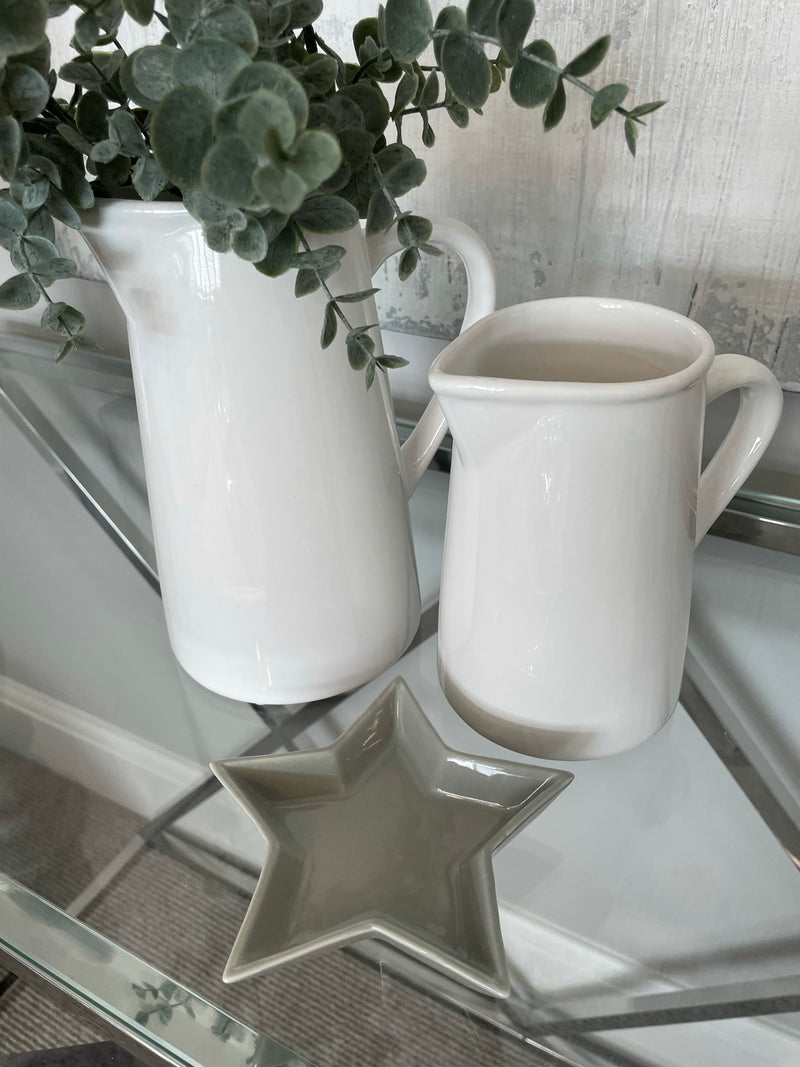 Medium simple white ceramic jug