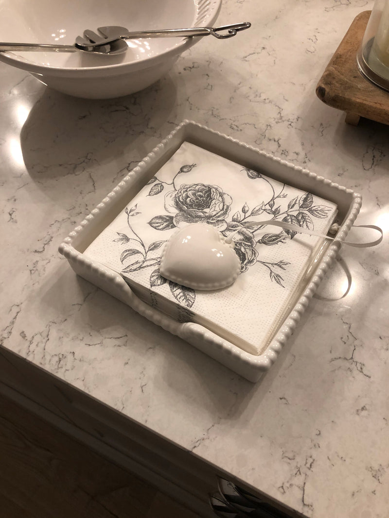 White ceramic napkin holder with weight