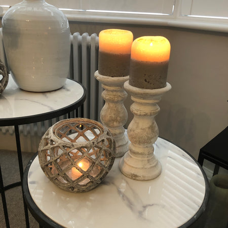 Pair of small stone candlesticks